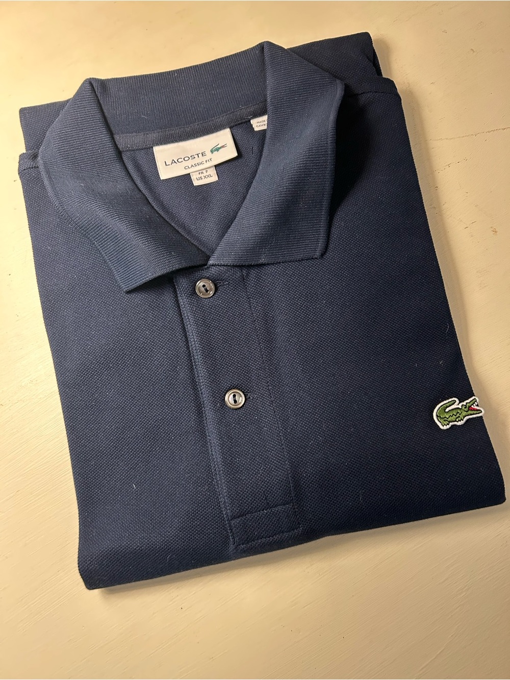 Lacoste Men’s Navy Cotton Piqué Polo. French Size “7” - US “XXL”